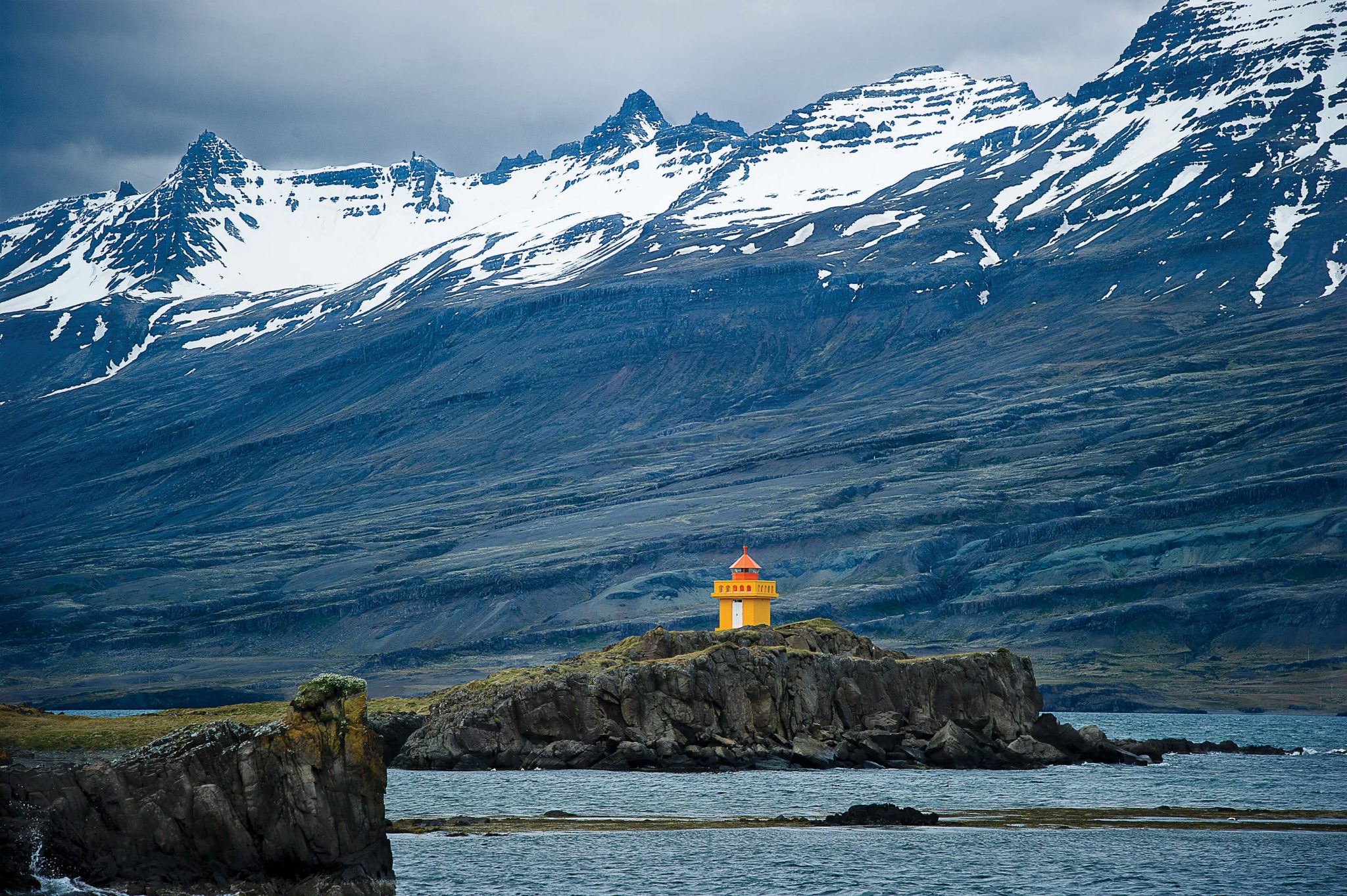 Lighthouse and Mountains